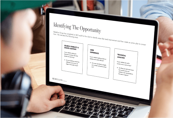 Laptop open with presentation on screen