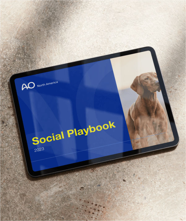 Tablet on counter with a social playbook example on screen